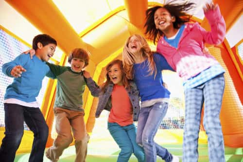 Kids having fun in a bounce house