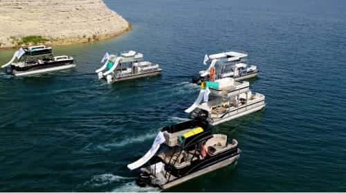 Fleet of Boats Lone Star Party Boat Rental Lake Travis